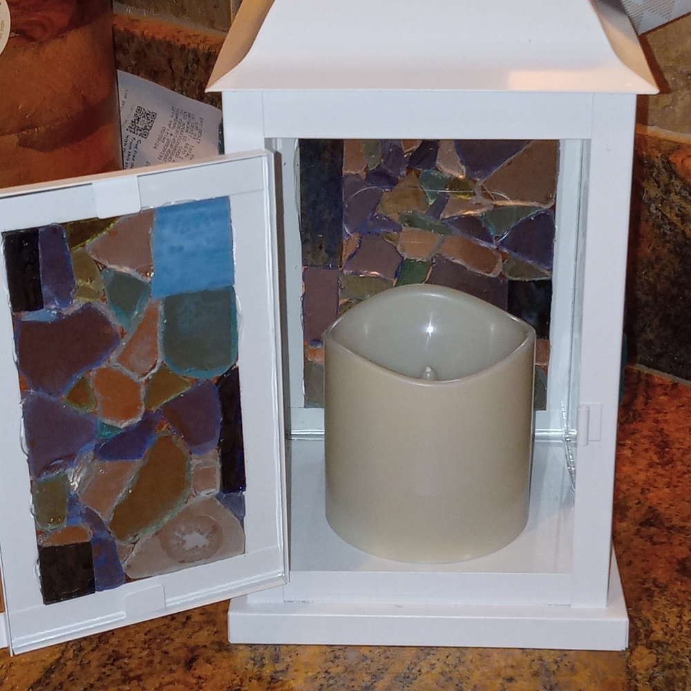 Candle lit multi colored mosaic lanter